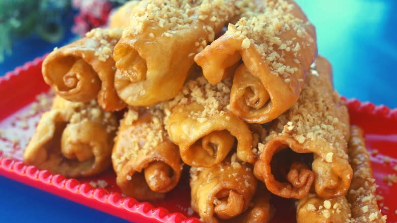 diples stacked on a red serving dish