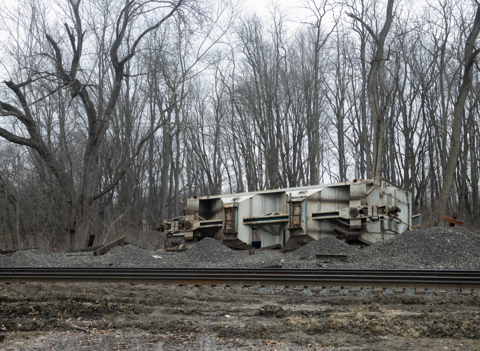 Two train cars remain at the scene, even though it's been more than three months since the Nov. 1 derailment in Ravenna Township.