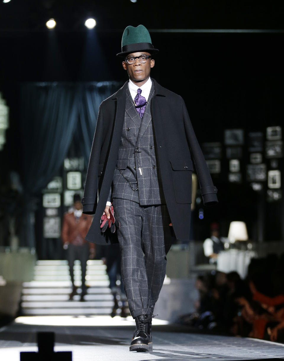 A model wears a creation for DSquared2 men's Fall-Winter 2013-14 collection, part of the Milan Fashion Week, unveiled in Milan, Italy, Tuesday, Jan. 15, 2013. (AP Photo/Antonio Calanni)