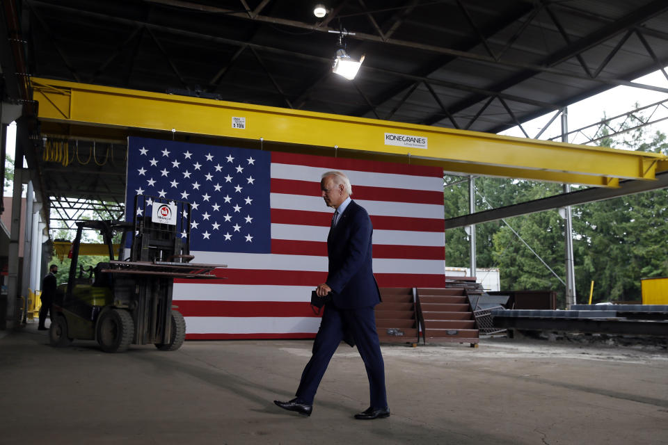 FILE - In this July 9, 2020, file photo Democratic presidential candidate former Vice President Joe Biden walks from the podium after speaking at McGregor Industries in Dunmore, Pa. Biden is pledging to define his presidency by a sweeping economic agenda beyond anything Americans have seen since the Great Depression and the industrial mobilization for World War II. (AP Photo/Matt Slocum, File)