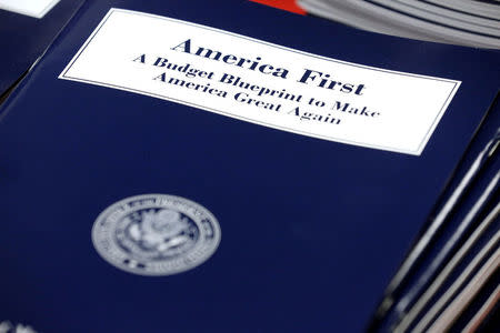 FILE PHOTO: U.S. President Donald Trump's overview of the budget priorities for Fiscal Year 2018 are displayed at the U.S. Government Publishing Office (GPO) on its release by the Office of Management and Budget (OMB) in Washington, U.S. on March 16, 2017. REUTERS/Joshua Roberts/File Photo