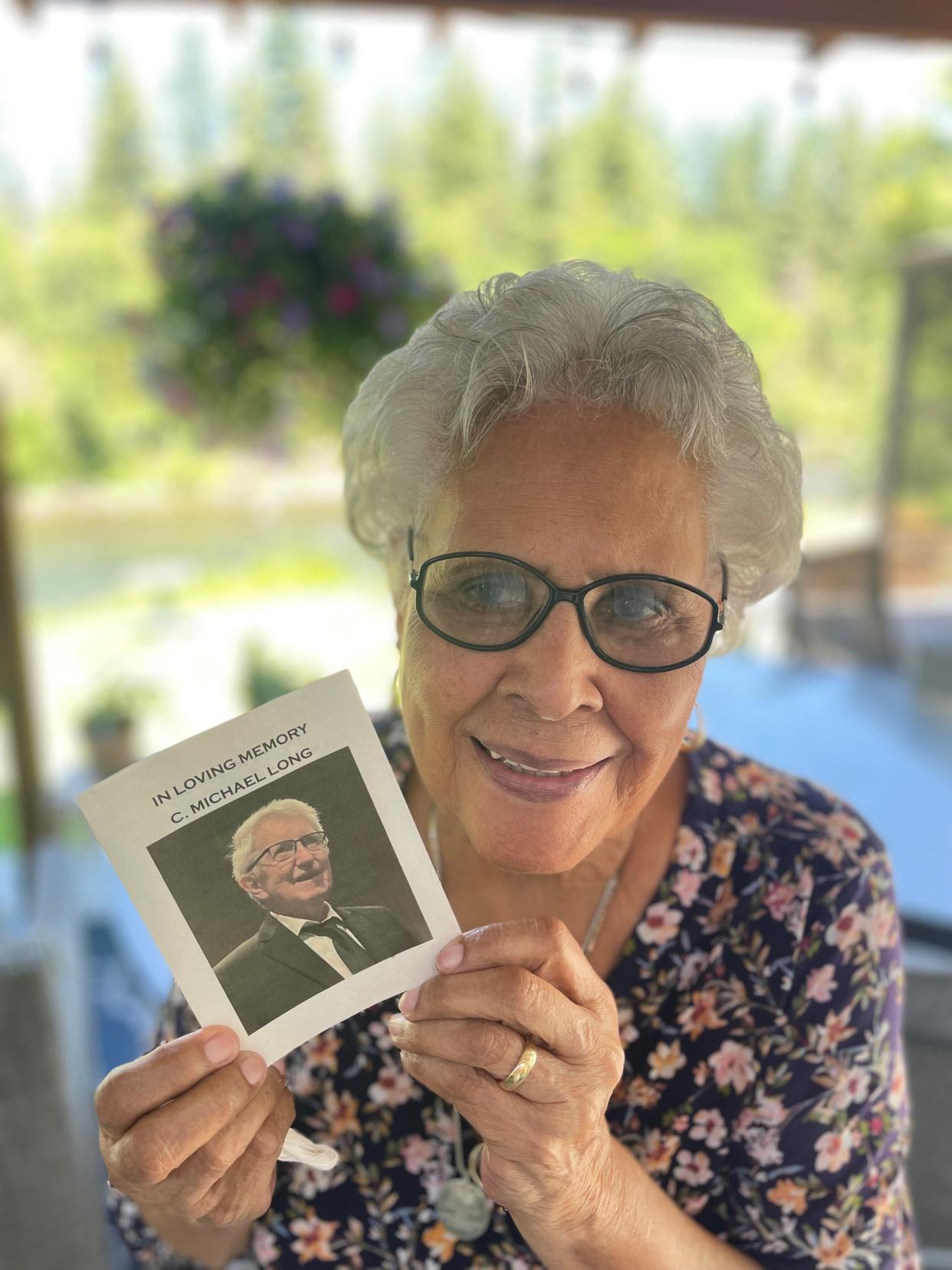 Jan Long with a picture of her late husband, Mike Long.