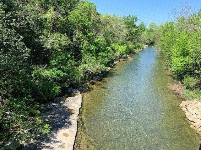 Williamson County does not have a river with enough sizeable flow to help disperse effluent from wastewater treatment plants, so it relies on small creeks like Brushy Creek, shown here as it meanders through Round Rock.