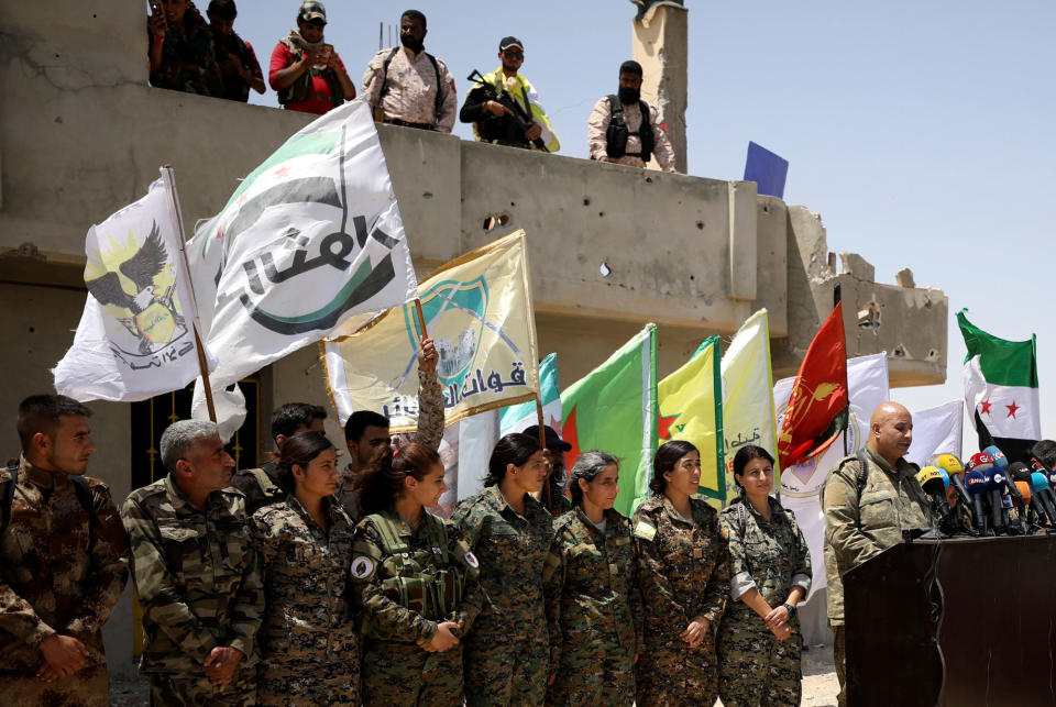 SDF spokesman Talal Silo speaks at a news conference