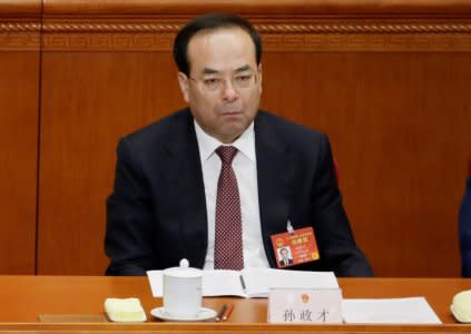 FILE PHOTO: Chongqing Municipality Communist Party Secretary Sun Zhengcai attends the opening session of China's National People's Congress (NPC) at the Great Hall of the People in Beijing, China March 5, 2017. Picture taken on March 5, 2017. REUTERS/Jason Lee