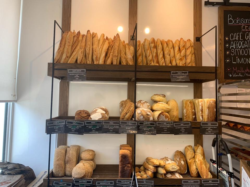 shelves of fresh bread in a cafe in montreal