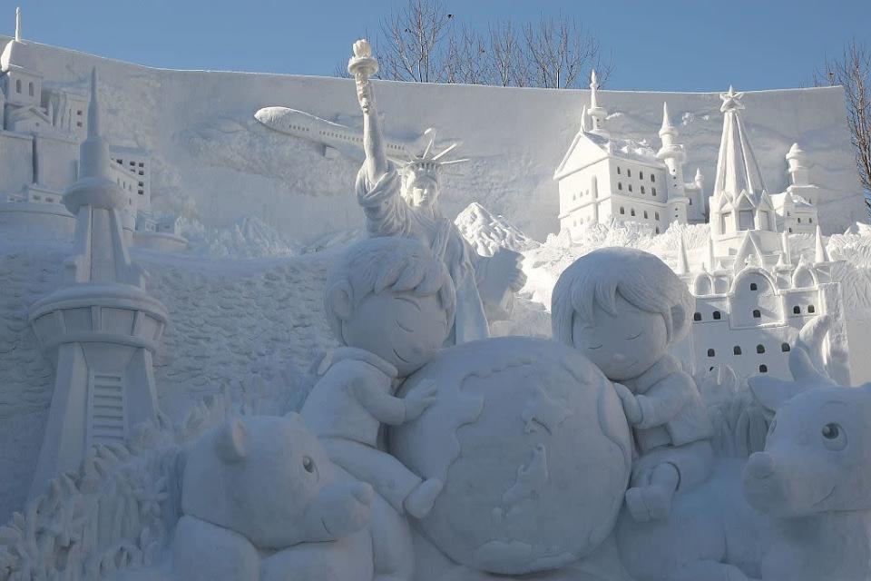 A snow sculpture of the Earth and the Future of Our Children is displayed at Odori Park in Sapporo, Japan.