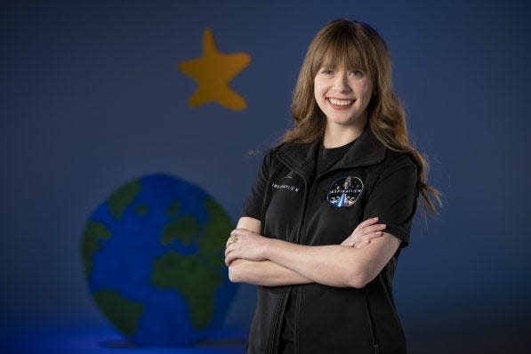 Hayley Arceneaux, a childhood cancer survivor and the youngest American to orbit Earth, has written a memoir, "Wild Ride: A Memoir of I.V. Drips and Rocket Ships."