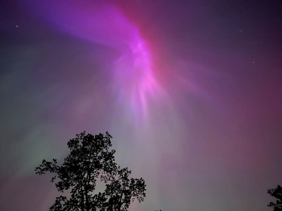 The Aurora Borealis, also known as the Northern Lights, is visible over Ann Arbor, Mich., early Saturday, May, 11, 2024. (AP Photo/Dee-Ann Durbin)