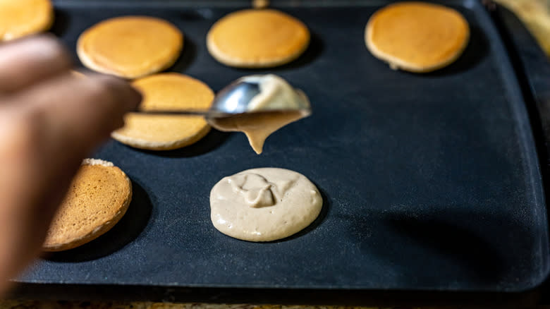 Making pancakes on griddle
