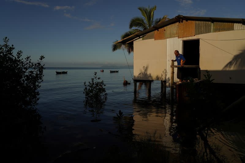 The Wider Image: Rising sea levels are forcing Fiji's villagers to relocate. They want polluters to pay instead