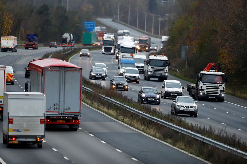 Vehicles on the M56 near Daresbury, as Britain will ban the sale of new petrol and diesel cars and vans from 2030, five years earlier than previously planned, in Cheshire