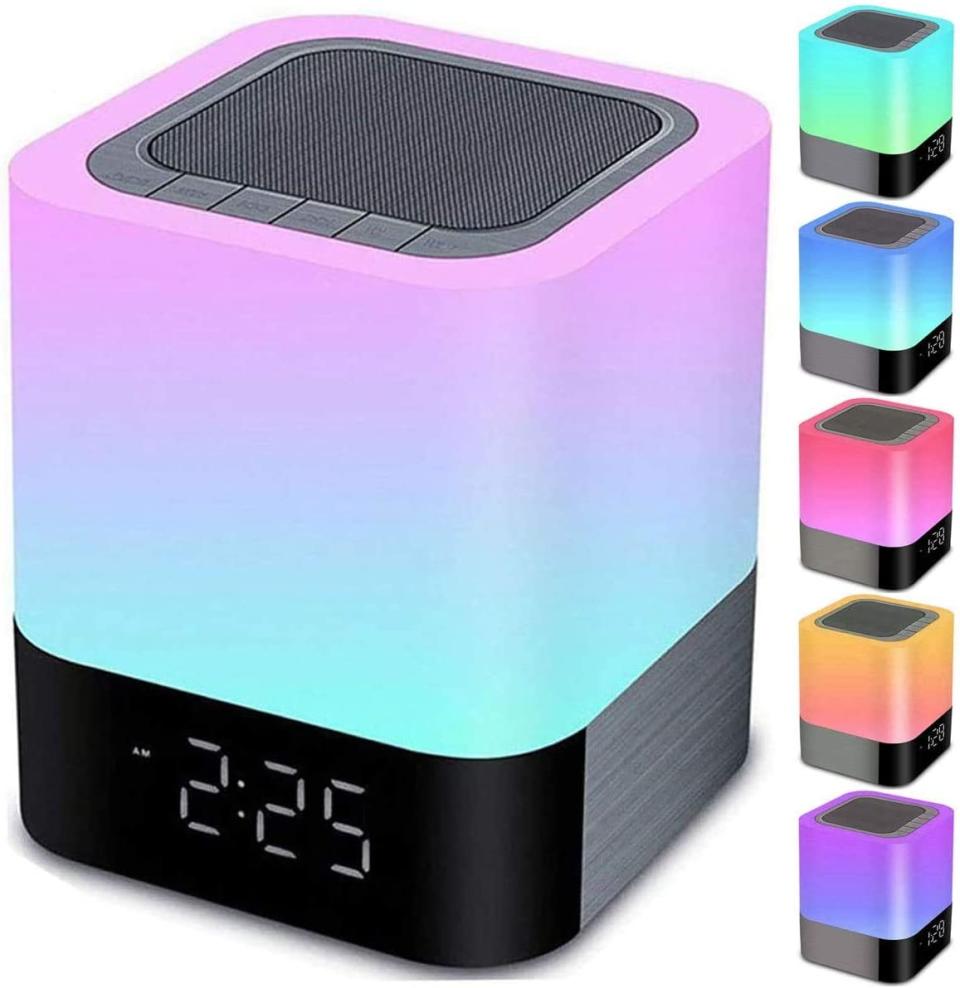 The Night Lights Bluetooth Speaker in various colours on a white background