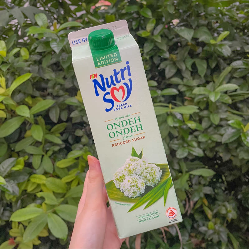 a hand in frame shot of nutrisoy's ondeh ondeh milk