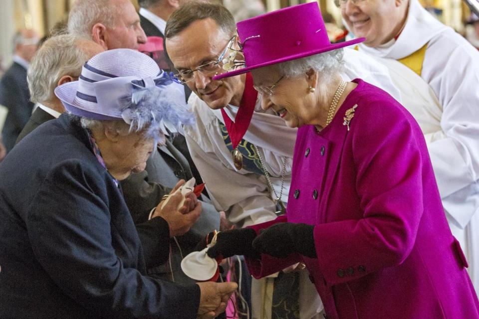 Queen Elizabeth II greeted parishioners as she left Blackburn Cathedral after attending the Royal Maundy Service in 2014 in Blackburn (Jack Hill - WPA Pool / Getty Images)