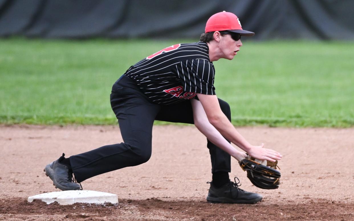 Eastern Greene shortstop Jacob Bellman catches the ball at second base for a force out of Bloomfield’s Chase Wiles during the baseball game at Eastern Greene on Friday, May 3, 2024.