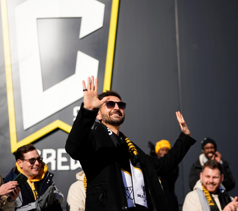 Dec 12, 2023; Columbus, OH, USA; Columbus Crew president Tim Bezbatchenko acknowledges fans as they celebrate their 2023 MLS Cup victory at Chase Plaza outside Lower.com Field.