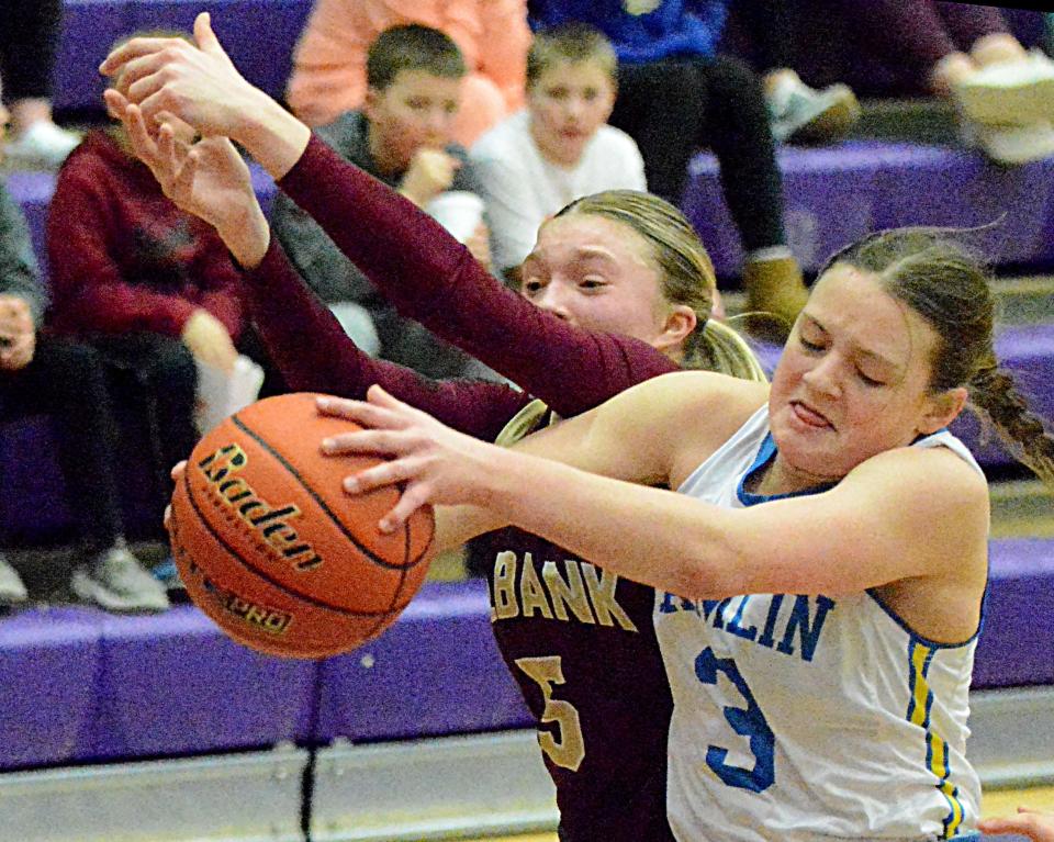 Hamlin's Addie Neuendorf grabs a rebounds against Milbank's Isabella Anderson during their SoDak 16 Class A state-qualifying girls basketball game on Thursday, March 2, 2023 in the Watertown Civic Arena.