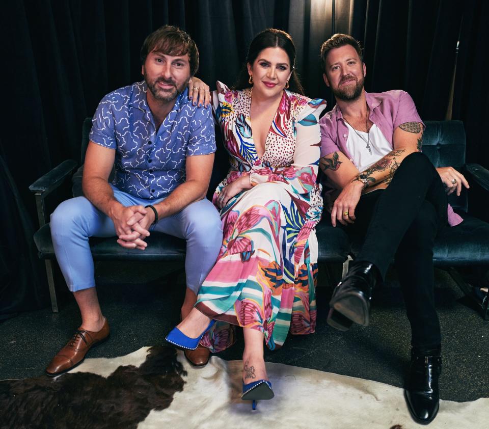 Dave Haywood, Hillary Scott and Charles Kelley of Lady A attend day 4 of The 49th CMA Fest at Nissan Stadium on June 12, 2022 in Nashville, Tennessee.