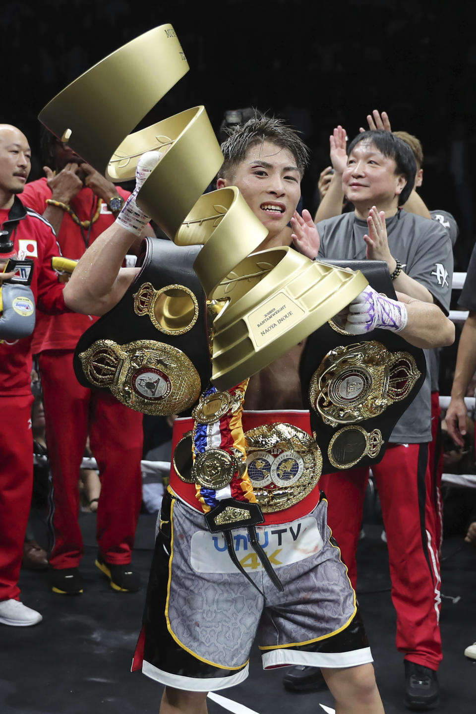 Japan's Naoya Inoue holds the Muhammad Ali Trophy after winning the World Boxing Super Series bantamweight final match in Saitama, Japan, Thursday, Nov. 7, 2019. Inoue beat Philippines' Nonito Donaire with a unanimous decision to win the championship. (AP Photo/Toru Takahashi)