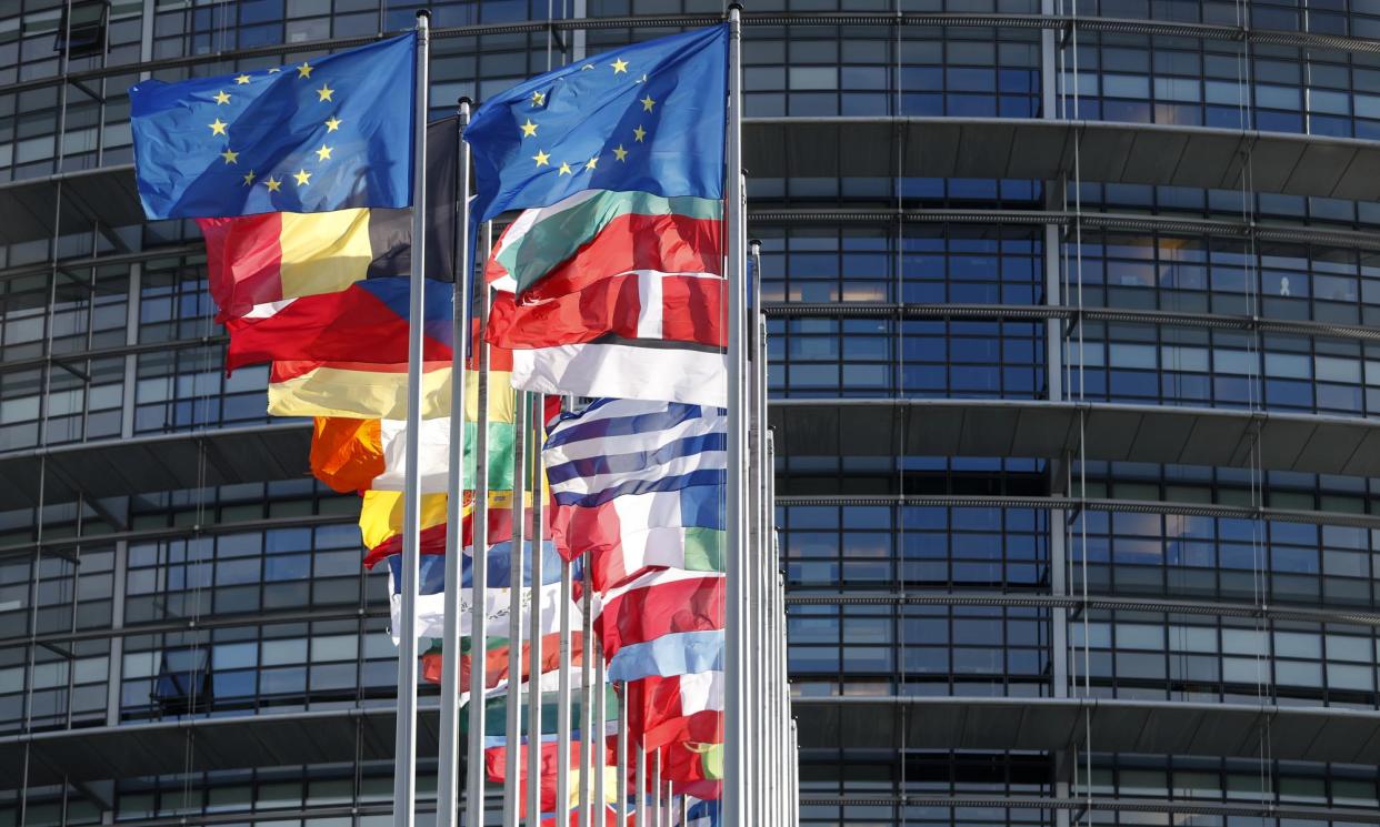 <span>European flags fly outside the European parliament in Strasbourg, eastern France. </span><span>Photograph: Jean-François Badias/AP</span>