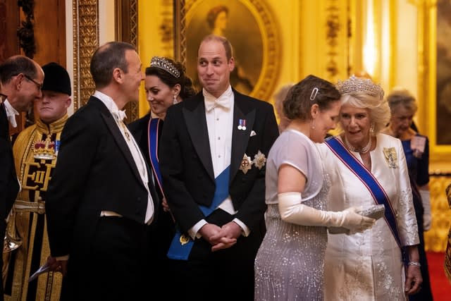 The Duke and Duchess of Cambridge joined the Duchess of Cornwall at the evening reception (Victoria Jones/PA)