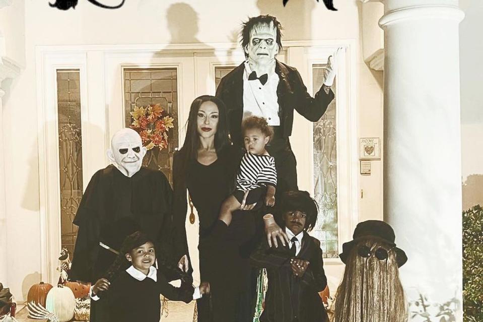 <p>Brittany Bell/Instagram</p> Brittany Bell and her kids dress as the Addams Family