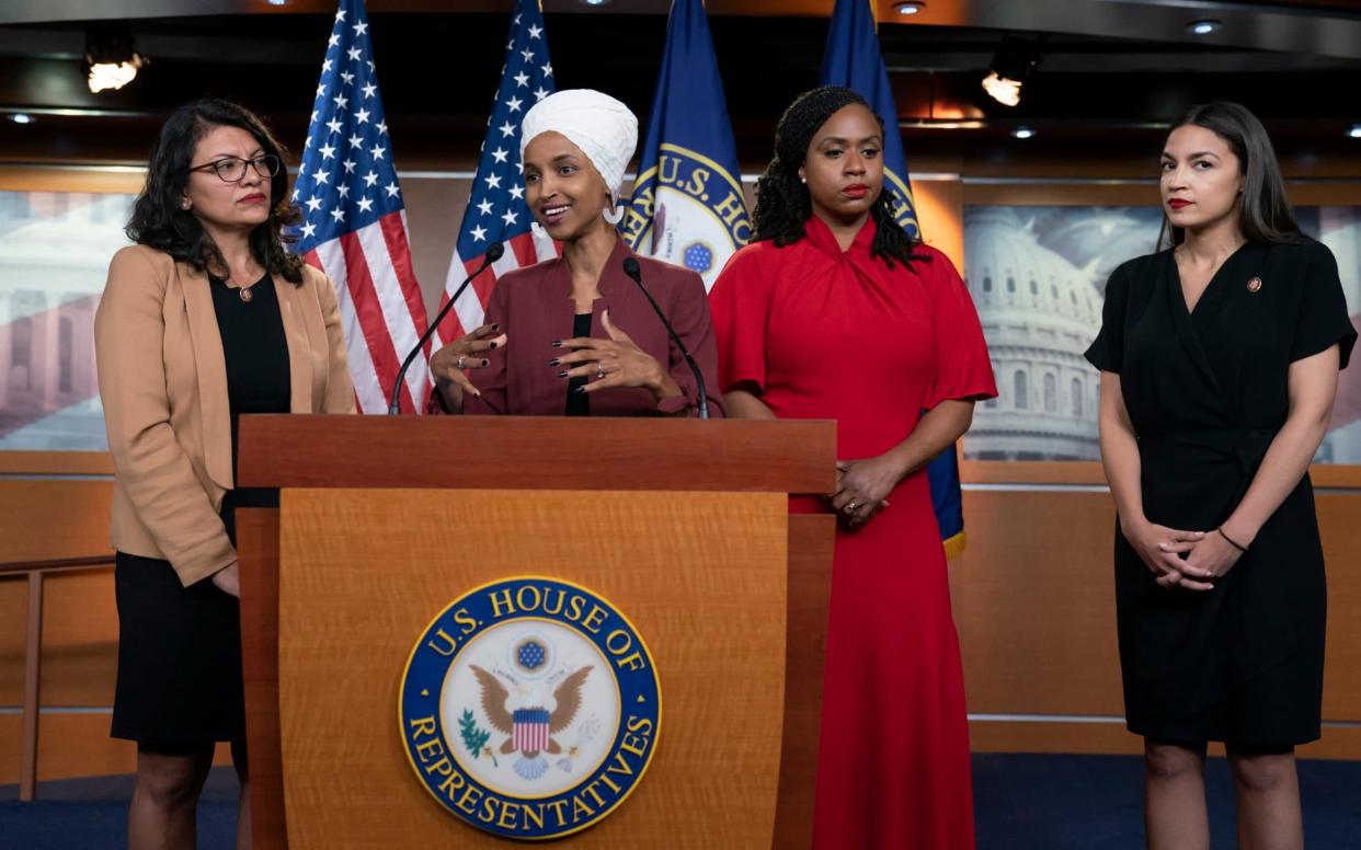 Ilhan Omar (front) and Rashida Tlaib (left) will be barred from entering Israel - AP