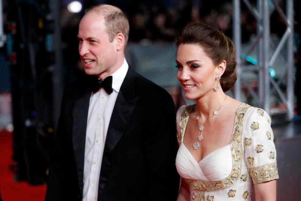 Britain's Prince William, Duke of Cambridge, (L) and Britain's Catherine, Duchess of Cambridge, (R) arrive at the BAFTA British Academy Film Awards at the Royal Albert Hall in London on February 2, 2020. (Photo by Tolga AKMEN / AFP) (Photo by TOLGA AKMEN/AFP via Getty Images)