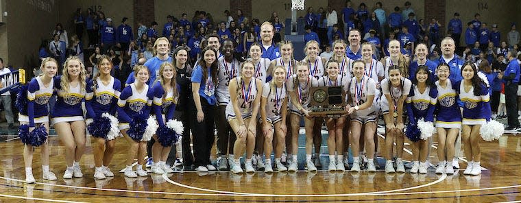 Sioux Falls O'Gorman's girls baskeball team is pictured with the trophy after the Knights defeated Brandon Valley 55-42 in the state Class AA championship on Saturday, March 9, 2024 in the Sanford Pentagon at Sioux Falls. O'Gorman completed a perfect 24-0 season.
