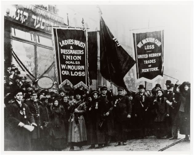 Demonstrators mourn the victims of the Triangle Shirtwaist Factory fire.