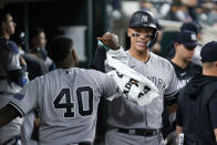New York Yankees' Aaron Judge, right, celebrates his home run with Luis Severino (40) in the seventh inning of a baseball game against the Detroit Tigers, Monday, Aug. 28, 2023, in Detroit. (AP Photo/Paul Sancya)