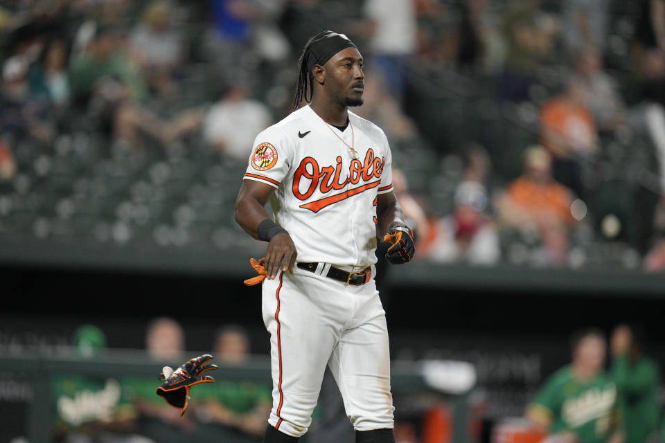 Baltimore Orioles' Jorge Mateo throws his batting gloves after striking out against the Oakland Athletics during the eighth inning of a baseball game Wednesday, April 12, 2023, in Baltimore. The Athletics won 8-4. (AP Photo/Jess Rapfogel)