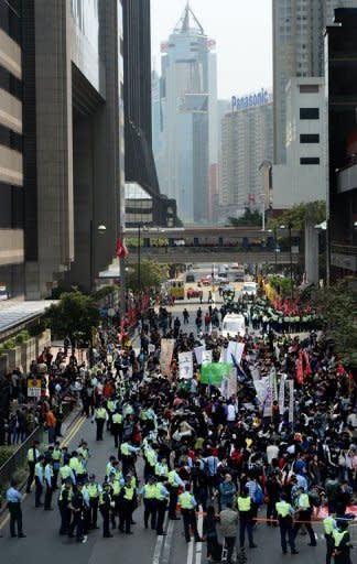 Former government adviser and property consultant Leung Chun-ying won Hong Kong's leadership election on Sunday, after the most divisive vote since the city reverted to Chinese rule in 1997. Thousands of protesters gathered outside the harbourside convention centre where the vote took place, demanding full democracy in the semi-autonomous former British colony