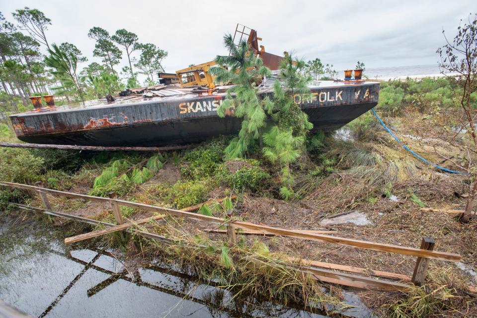 A Skanska barge aground at Naval Air Station Pensacola on Sunday, Sept. 20, 2020. The Department of Justice is suing Skanska for damages and expenses the Navy incurred as a result of Skanska failing to properly secure its construction barges during Hurricane Sally.