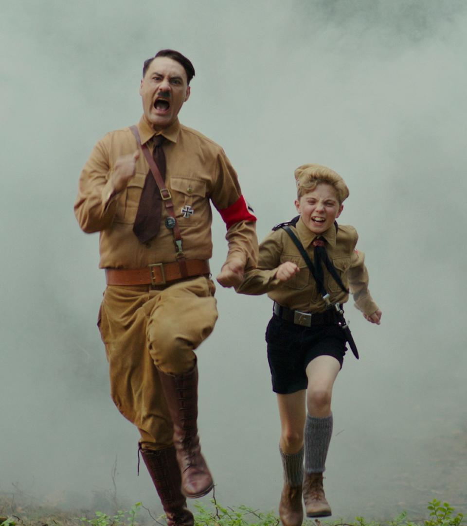 Taika Waititi stars as imaginary friend Adolf Hitler and Roman Griffin Davis is his buddy Jojo in "Jojo Rabbit."