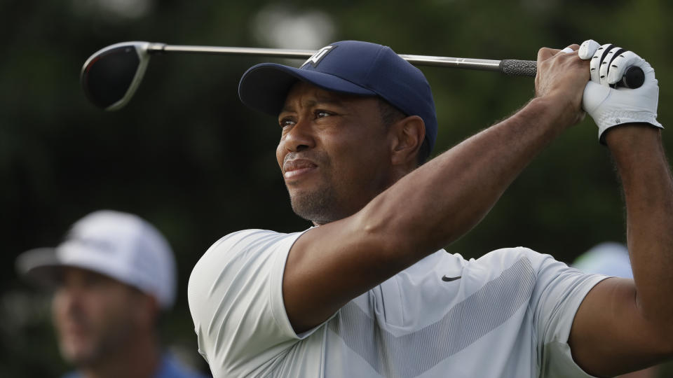 Tiger Woods tees off in the Northern Trust golf tournament at Liberty National Golf Course, Thursday, Aug. 8, 2019 in Jersey City, N.J. (AP Photo/Mark Lennihan)