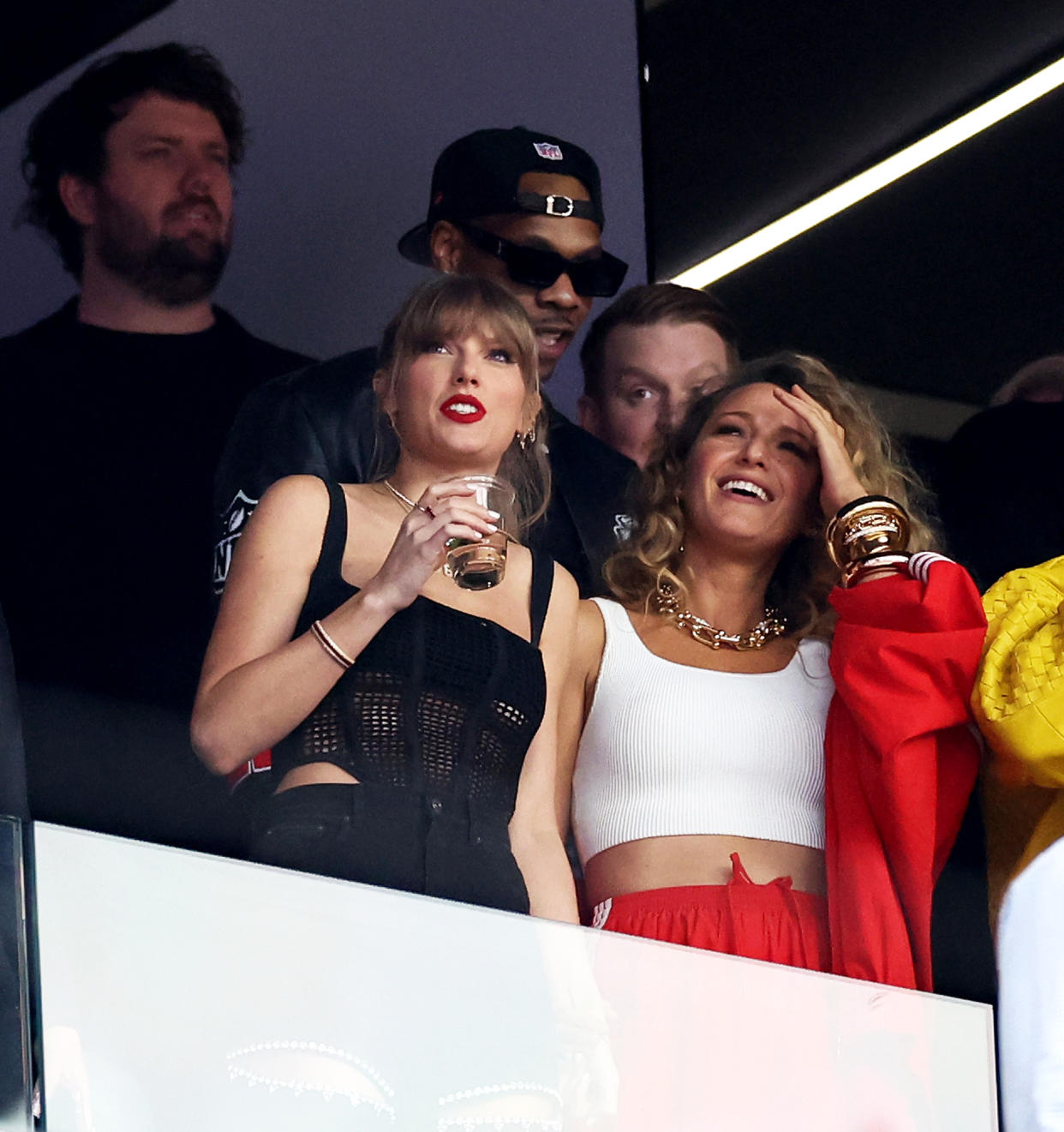 Taylor Swift Matches Travis Kelce With Black Outfit at 2024 Super Bowl