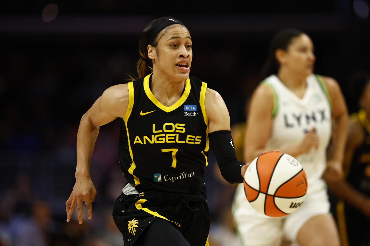 LOS ANGELES, CALIFORNIA - JULY 31: Chennedy Carter #7 of the Los Angeles Sparks in the first quarter at Crypto.com Arena on July 31, 2022 in Los Angeles, California.  NOTE TO USER: User expressly acknowledges and agrees that, by downloading and or using this Photograph, user is consenting to the terms and conditions of the Getty Images License Agreement. (Photo by Ronald Martinez/Getty Images)