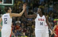 2016 Rio Olympics - Basketball - Final - Women's Gold Medal Game USA v Spain - Carioca Arena 1 - Rio de Janeiro, Brazil - 20/8/2016. Diana Taurasi (USA) of USA and Tina Charles (USA) of USA celebrate. REUTERS/Jim Young