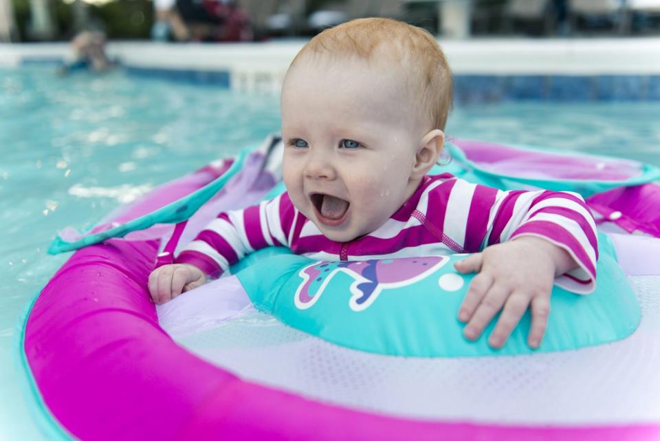 An image of a baby in a pool.