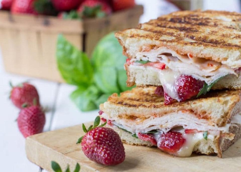 <p>Spicy Southern Kitchen</p><p>A delicious spring Panini with strawberries, brie, smoked turkey, fresh basil and red pepper jelly.</p><p><strong>Get the recipe: </strong><a href="https://spicysouthernkitchen.com/strawberry-brie-turkey-panini/" rel="nofollow noopener" target="_blank" data-ylk="slk:Strawberry, Brie, and Turkey Panini;elm:context_link;itc:0;sec:content-canvas" class="link "><strong>Strawberry, Brie, and Turkey Panini</strong></a></p>