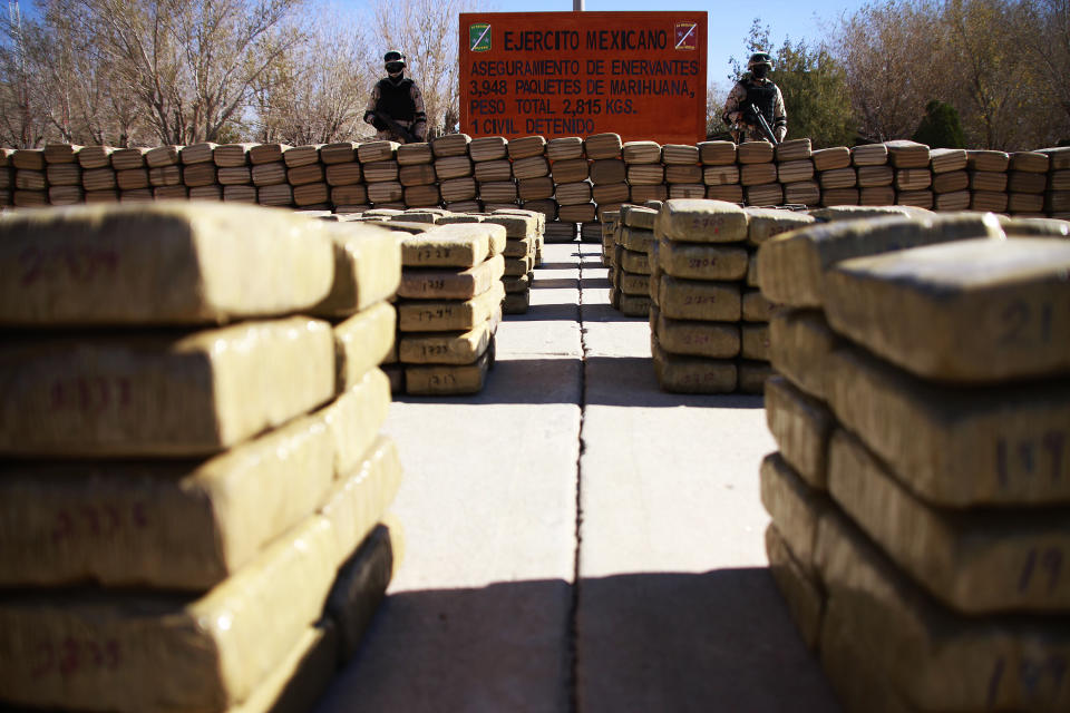 Mexican Army presents in the military garrison of the city seized drug packages. (Getty)