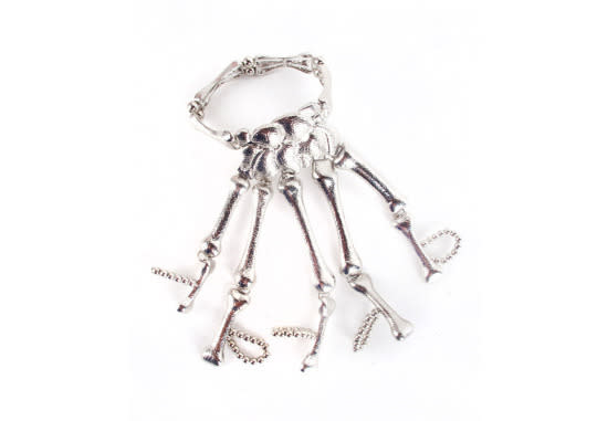 Doesn’t get much more Halloween (or clever) than a silver skeleton hand bracelet!