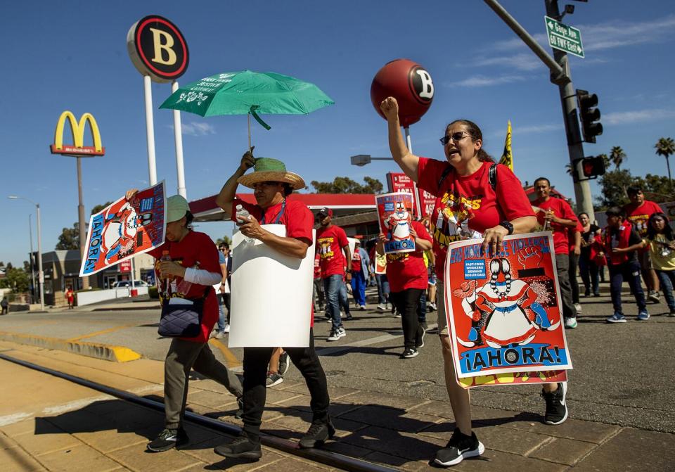 Fast-food workers rally outside a McDonald's in Monterey Park in 2023.