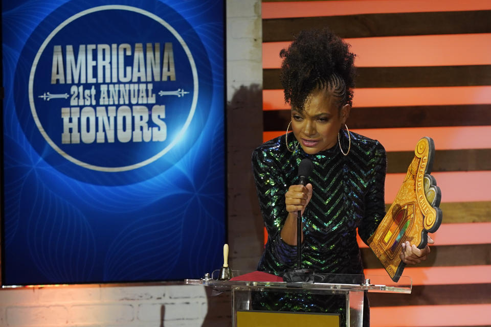 Allison Russell accepts the award for Album of the Year at the Americana Honors & Awards show Wednesday, Sept. 14, 2022, in Nashville, Tenn. (AP Photo/Mark Humphrey)