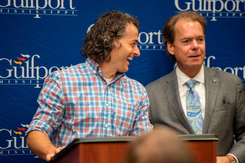 Gulfport Mayor Billy Hewes introduces artist Charles Buckley before unveiling a painting commissioned by Hewes for the 125th anniversary of the city of Gulfport at the Gulfport Police Department on Tuesday, July 18, 2023.