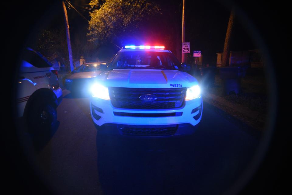 Lights are flashing on a Shreveport Police Department vehicle.