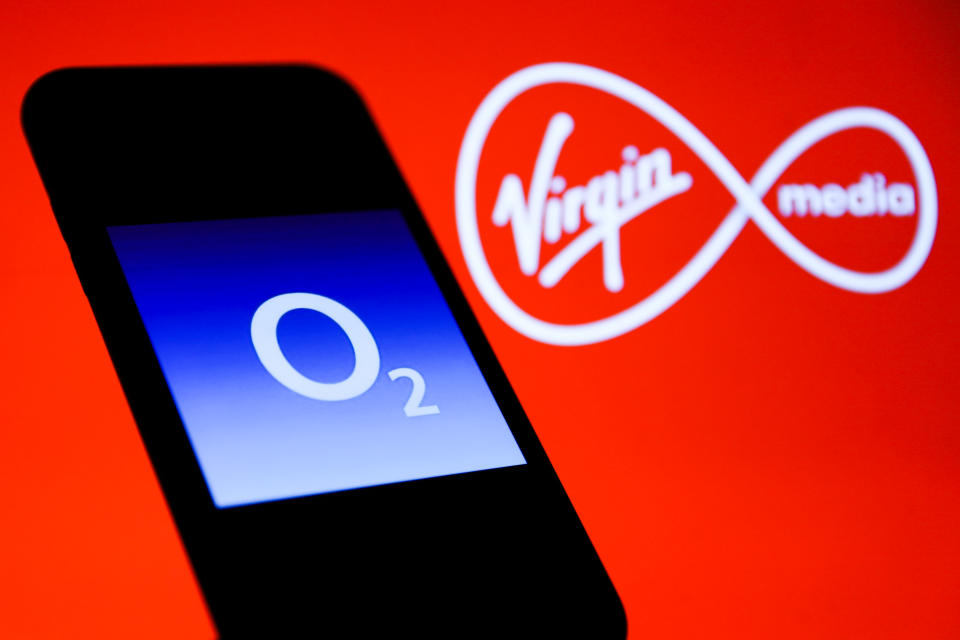 O2 logo is seen displayed on a phone screen with Virgin Media logo displayed on the background in this illustration photo taken in Poland on November 19, 2020. (Photo by Jakub Porzycki/NurPhoto via Getty Images)