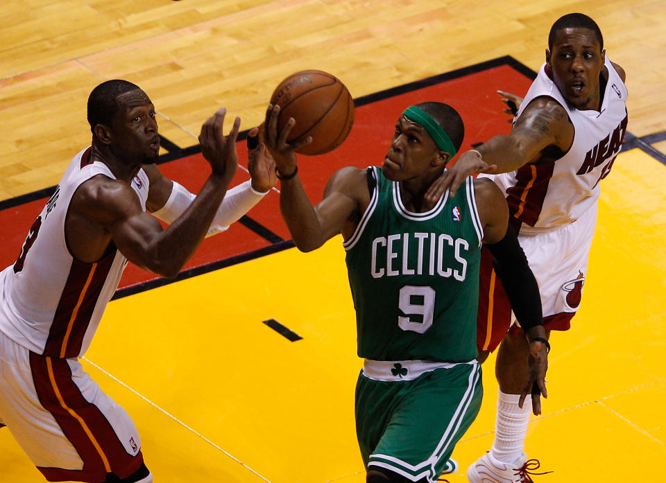 MIAMI, FL - JUNE 09: Rajon Rondo #9 of the Boston Celtics goes up for a shot between Dwyane Wade #3 and Mario Chalmers #15 of the Miami Heat in the first half in Game Seven of the Eastern Conference Finals in the 2012 NBA Playoffs on June 9, 2012 at American Airlines Arena in Miami, Florida. (Photo by J. Meric/Getty Images)